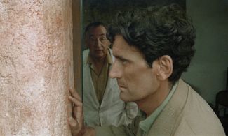 Philippe Noiret and Massimo Troisi in The Postman (1994)