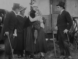 Lloyd Bacon, Charlotte Mineau, and Edna Purviance in The Vagabond (1916)