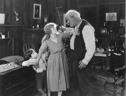 Frankie Lee, Mary Miles Minter, and Theodore Roberts in Judy of Rogues' Harbor (1920)