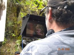 In the director's chair looking at next scene.