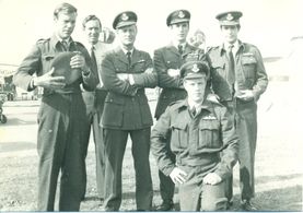 RAF Mosquito pilots preparing for a mission, including Pilot Officer Jamie Jameson (Christopher Toyne, kneeling)