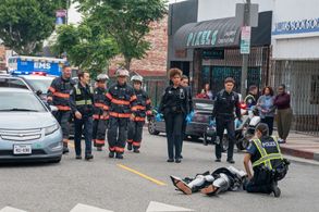 Rob Lowe, Gina Torres, Mike Kopera, Jim Parrack, Julian Works, Brianna Baker, and Natacha Karam in 9-1-1: Lone Star (202