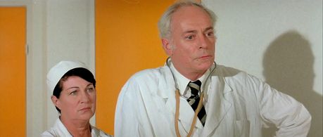 Dominique Davray and Jean Martin in The Wing or The Thigh? (1976)