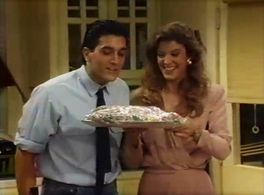 Alison La Placa and Tom Silardi in Open House (1989)