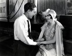 Louise Lorraine and Jack Pickford in Exit Smiling (1926)