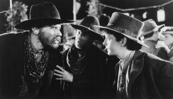 Michael J. Fox, Tom Wilson, and Sean Sullivan in Back to the Future Part III (1990)