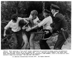 Keith Barron, Colin Farrell, Doug McClure, John McEnery, and Bobby Parr in The Land That Time Forgot (1974)