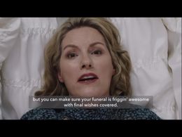 Pam Eichner filming in a coffin. Spokesperson for end of life insurance.