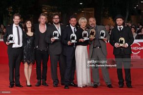 The 4th Rome Film Festival - Official Awards Ceremony Photocall ROME - OCTOBER 23: (L to R) Director Andrew Lang, guest,