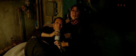 Park Myeong-hoon and Lee Jeong-eun in Parasite (2019)