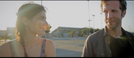 still of Robyn Buck & Ben Begley in 