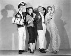 Piper Laurie, Jimmy Durante, Joyce Holden, and Donald O'Connor in The Milkman (1950)