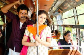 Karthi and Sayyeshaa Saigal in Kadaikutty Singam (2018)