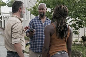Andrew Lincoln, Danai Gurira, and Kenric Green in The Walking Dead (2010)