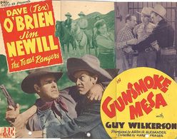 Roy Brent, Kermit Maynard, Patti McCarty, James Newill, Dave O'Brien, and Guy Wilkerson in Gunsmoke Mesa (1944)