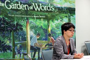 Makoto Shinkai at an event for The Garden of Words (2013)