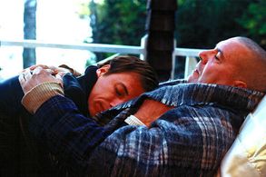 Rémy Girard and Stéphane Rousseau in The Barbarian Invasions (2003)