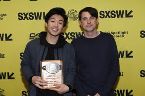 Sam Davis and Sean Wang at an event for Nai Nai & Wài Pó (2023)