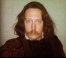 Working on Tim Burton's 'Alice in Wonderland'. The mustache is real, the hair is not. The costumes won an Academy Award!