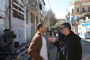 Lucas Akoskin and Amos Gitai on the set of Words With Gods.