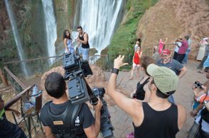 Director Aziz Tazi guiding Jayda Berkmen and Richie Chance on the set of Night Walk in Ouzoud, Morocco