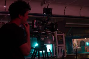 Checking the shot on the set of 2:AM