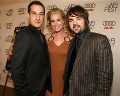 Matt Checkowski (L),Rebecca Romijn, Kurt Mattila on the AFI Fest red carpet.