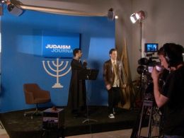 Aaron Abrams and Zaib Shaikh in Little Mosque on the Prairie (2007)