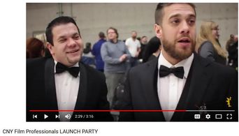 Kevin Alan Wall and Allen John Wall being interviewed for news at CNY Film Professionals Launch Party