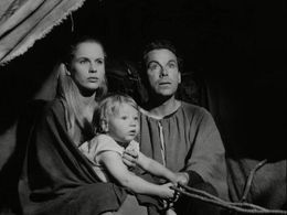 Bibi Andersson, Tommy Karlsson, and Nils Poppe in The Seventh Seal (1957)