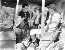 Marie Burton, Bill Cody, Allen Greer, and Stuart James in The Texas Rambler (1935)