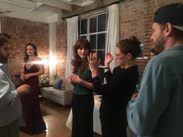 BTS Hilary Staton working with Director, Devi Brule, and Cinematographer, Adam Bial, on the set of 