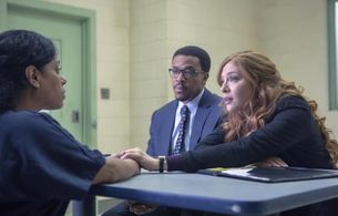 Russell Hornsby, Rachelle Lefevre, and Liza Colón-Zayas in Proven Innocent (2019)