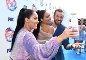 Artem Chigvintsev, Brie Bella, and Nikki Bella