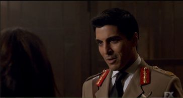 Sibylla Deen and Keon Alexander in Tyrant (2014)