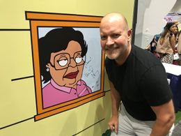 Mike Henry and Consuela on the floor of Comic-con 2017.