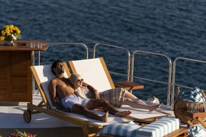 Julia Garner and Saamer Usmani in Inventing Anna: The Devil Wore Anna (2022)