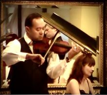 Playing violin for charity event