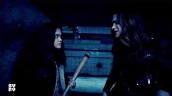 Martina as Rachel Valdez in Syfy's Wynonna Earp, alongside Melanie Scrofano.