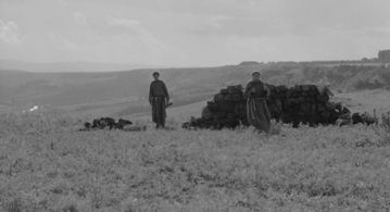 Ninetto Davoli and Totò in The Hawks and the Sparrows (1966)