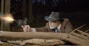 Eric Parkinson as Marshal Heck Thomas in The Legend of Belle Starr