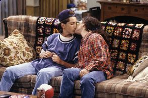 Sara Gilbert and Matt Norero in Roseanne (1988)