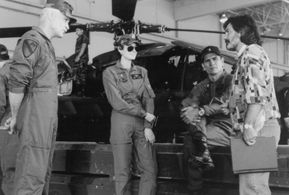 Tommy Lee Jones, Sean Young, Dale Dye, and David Green in Fire Birds (1990)