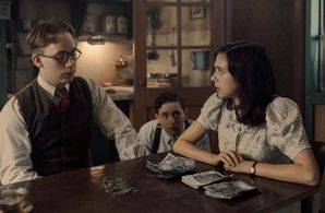 Preston Nyman, Bel Powley, and Joe Cole in A Small Light (2023)