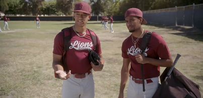 Sylvester Powell and Peyton Alex Smith in All American Homecoming.