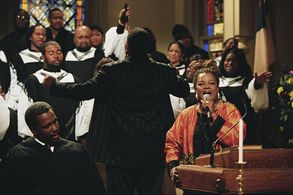 (Left) Wendell Pierce as Reverend Lewis (center with back toward camera) Cuba Gooding, Jr. as Darrin Hill and (right) Re
