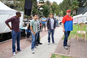 Eric Stonestreet, Christian Gehring, Kegn Matungulu, Phillip Fallon, and Damien Diaz in Modern Family (2009)