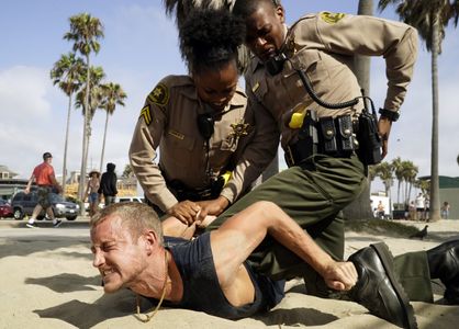 Levon gets cuffed.