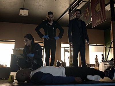 Tom Ellis, Lauren German, and Sean Millington in Lucifer (2016)