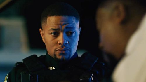 Donny Carrington as Officer Freddie Nelson in 